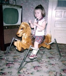 At Grandma and Grandpa's house. Note my invisible reins.